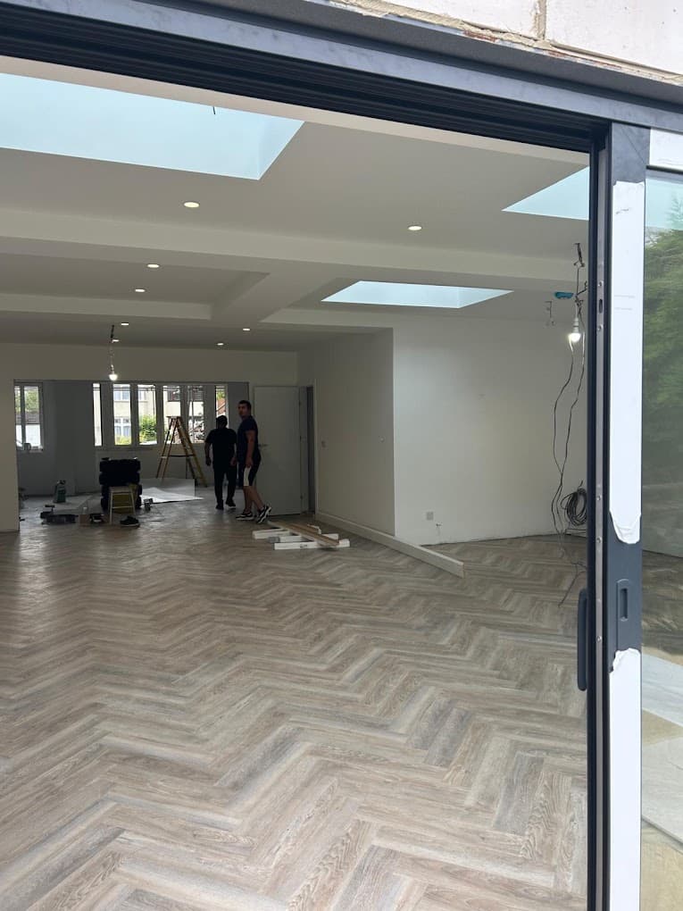 Quality flooring laid level with neat edging throughout